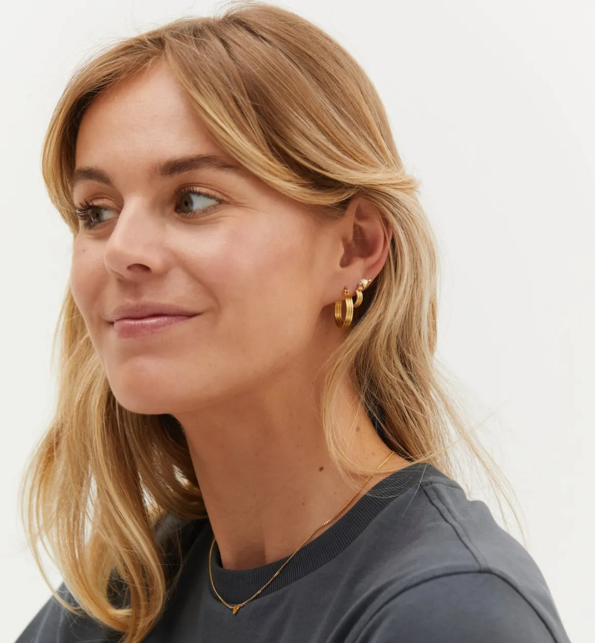 Anna + Nina ​Verguld | Zilver & Verzilverd | Single Cupid Stud Earring